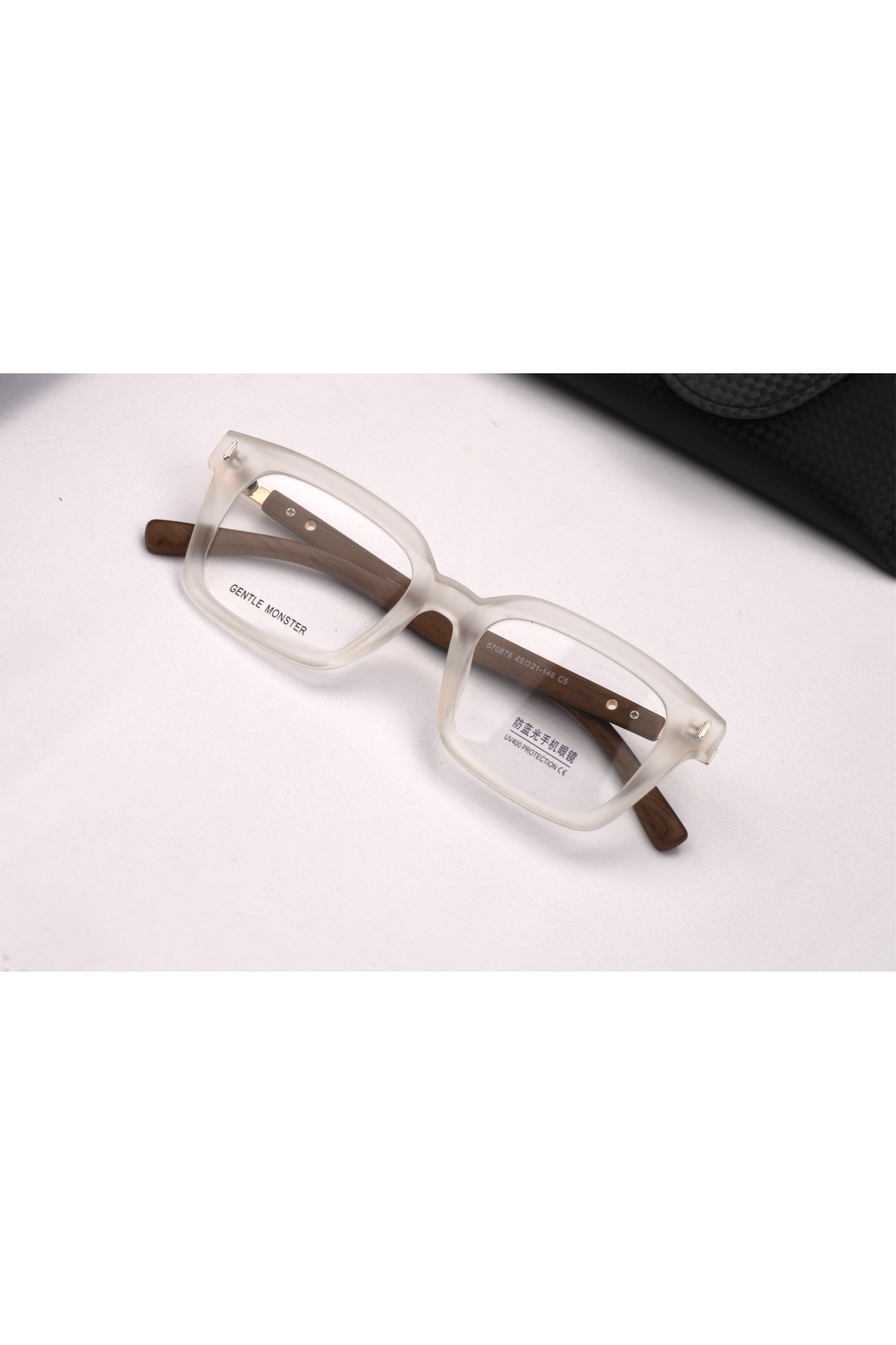 عینک طبی جنتل مانستر دسته کائوچو یووی ۴۰۰(۵۷۰۸۷۶)